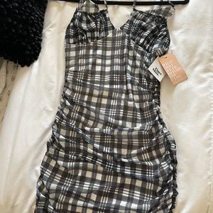 Never worn. Price tags attached